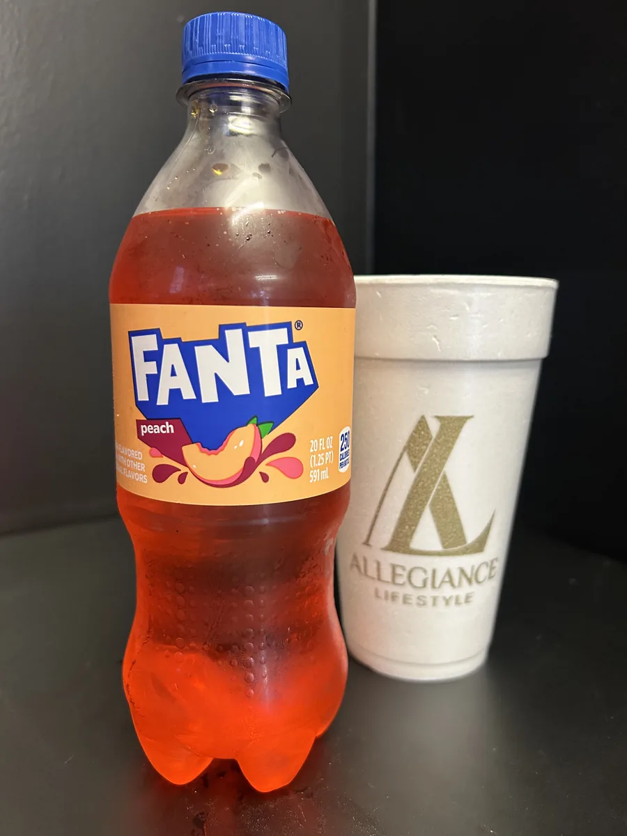 Peach soda bottle by Fanta