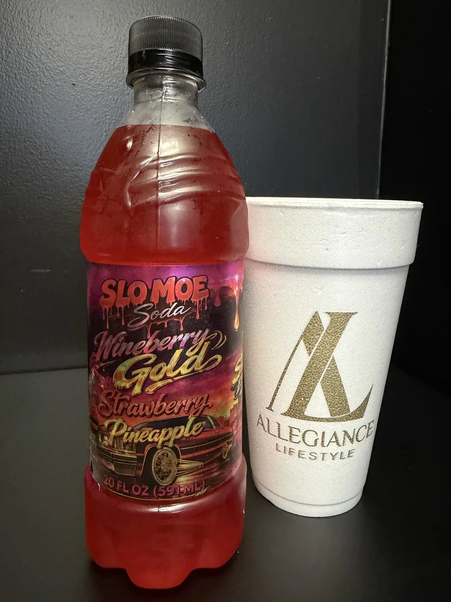 Wineberry Gold Strawberry Pineapple soda bottle by Slo Moe Soda