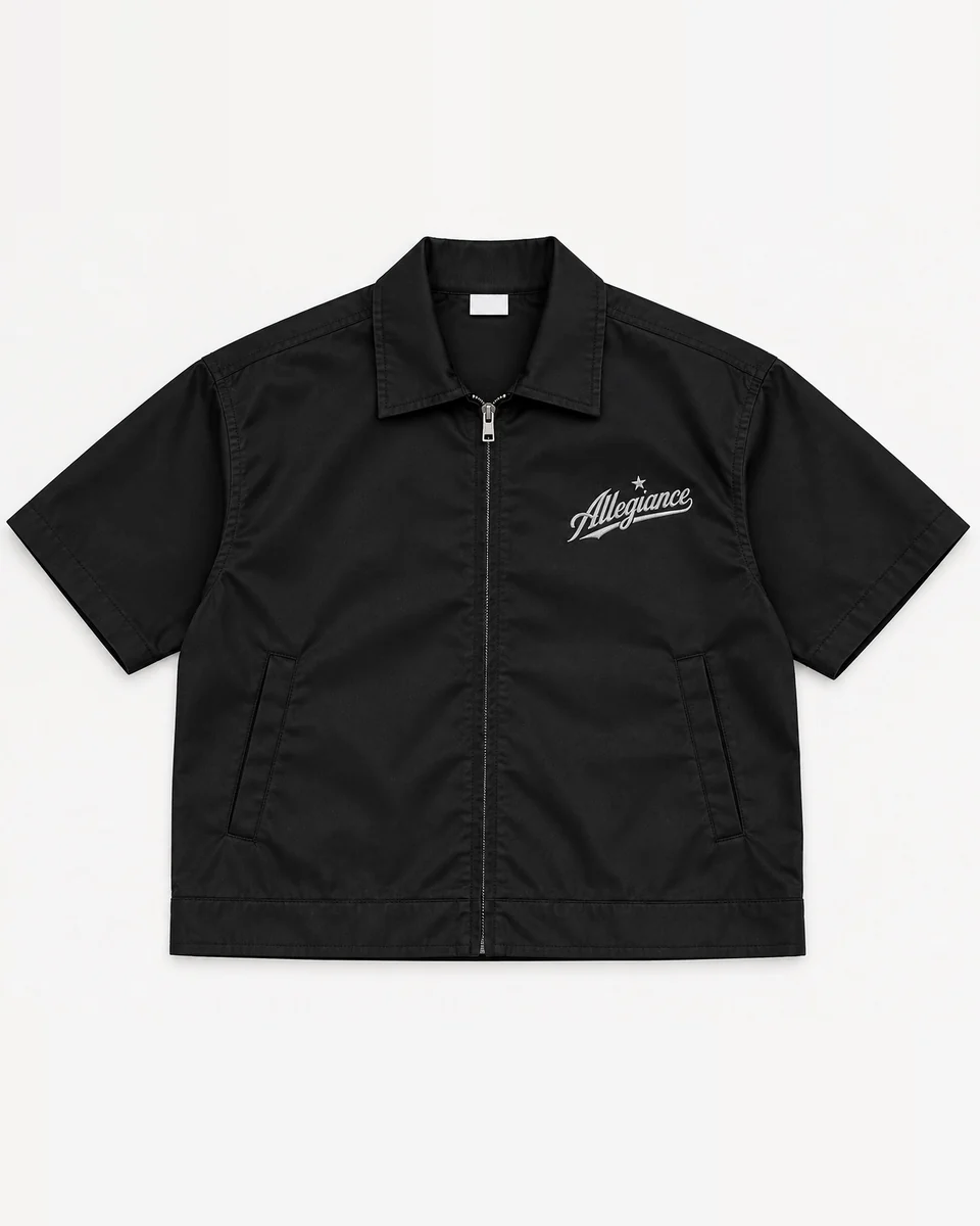Black short-sleeve zip top with silver Allegiance script and matching black shorts by Allegiance Lifestyle