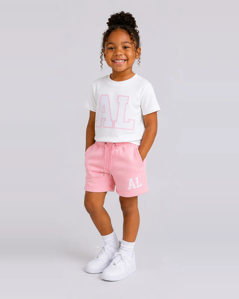 White AL T-shirt and pink shorts set for children by Allegiance Lifestyle