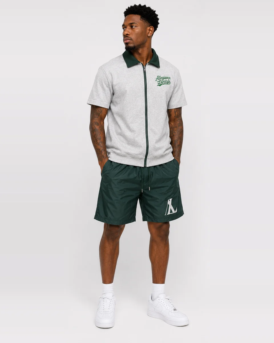 Gray zip-collar top with green shorts by Allegiance Lifestyle