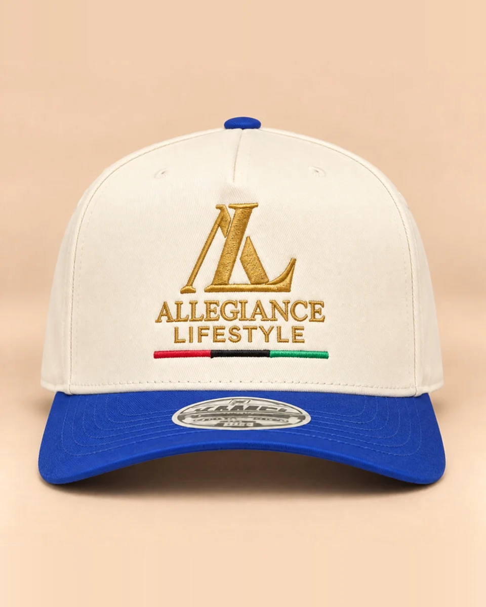Cream snapback with royal blue brim and gold Allegiance Lifestyle logo by Allegiance Lifestyle