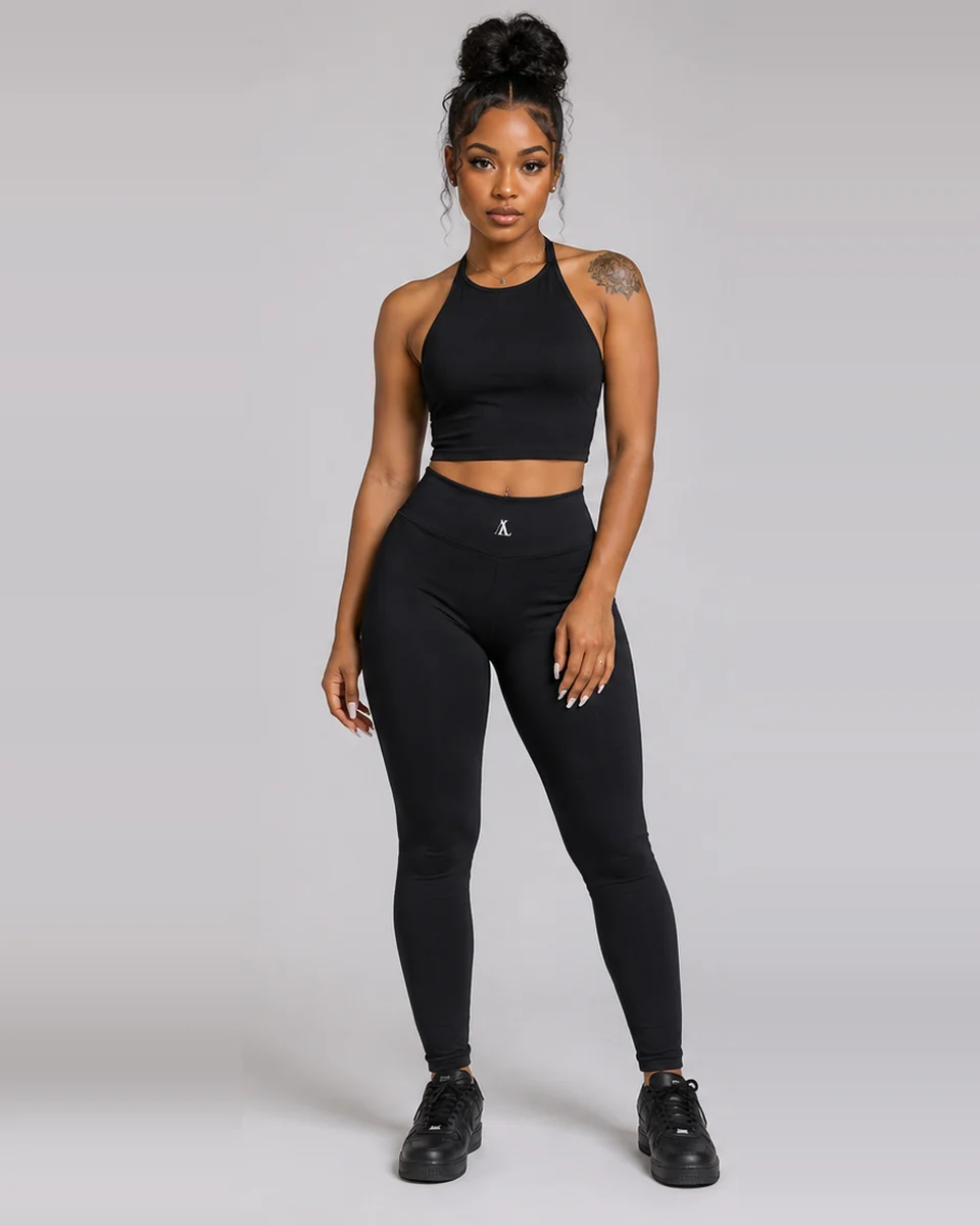 Black halter crop top and ruched leggings set by Allegiance Lifestyle